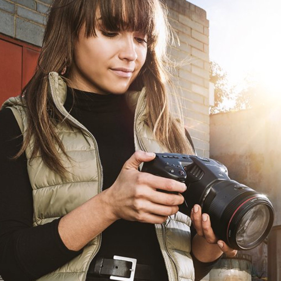 Woman holding Blackmagic 6k camera
